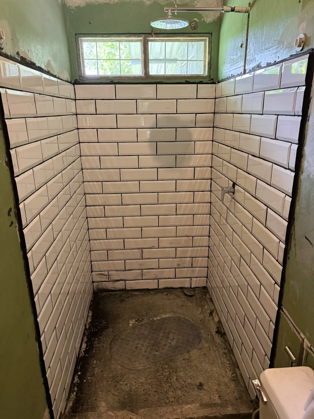 Ducha terminada con azulejos